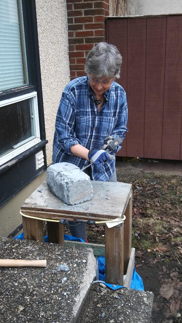 Sheree carving in yard pic 1